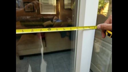Professional technician using precision measuring tools to measure sliding door glass panel dimensions for exact custom replacement