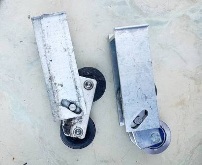Before and After comparison of worn plastic roller vs new stainless steel roller